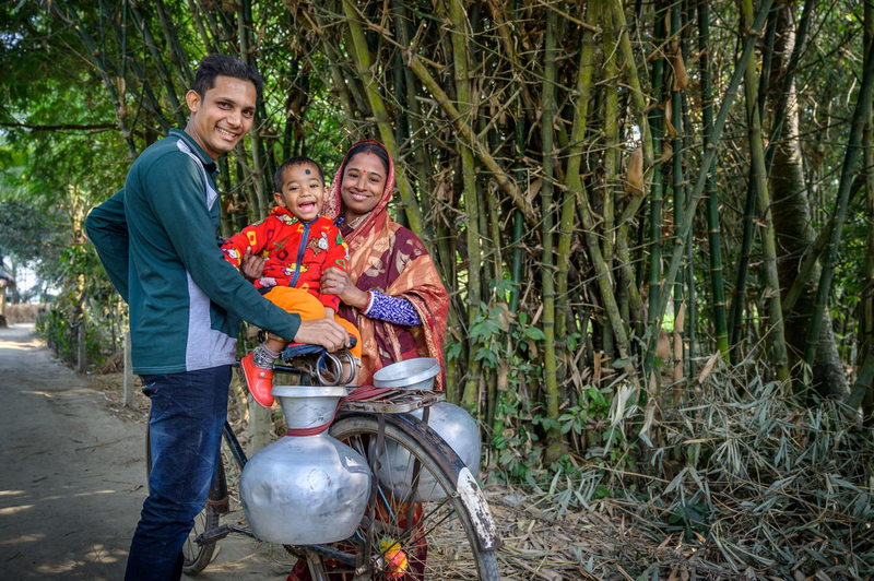 Bikash carries home clean water