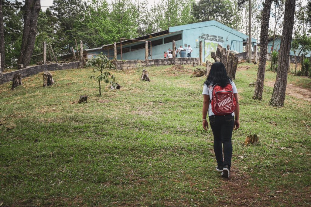 Digna walks to school in Mezcalito, Honduras. Facing the possibility of child labor, Digna was able to pursue education with help from U.S. government aid and World Vision staff in Honduras.