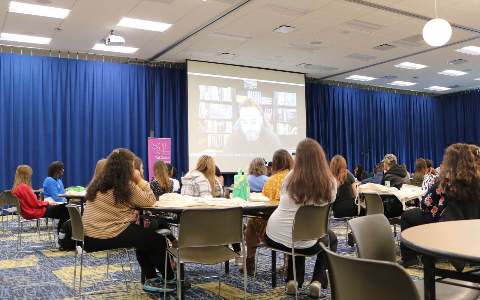 YES 2023 Keynote Speaker Andrew Aydin On Screen