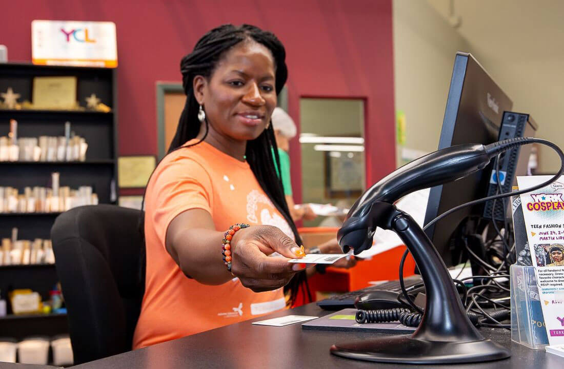 Staff Scanning Library Card