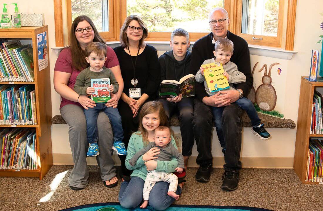 Happy Family Grandparents Parents Kids Baby Smile With Library Books